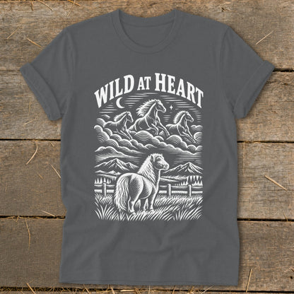 Gray t-shirt with "Wild at Heart" text and a graphic of horses running above mountains and a pony.