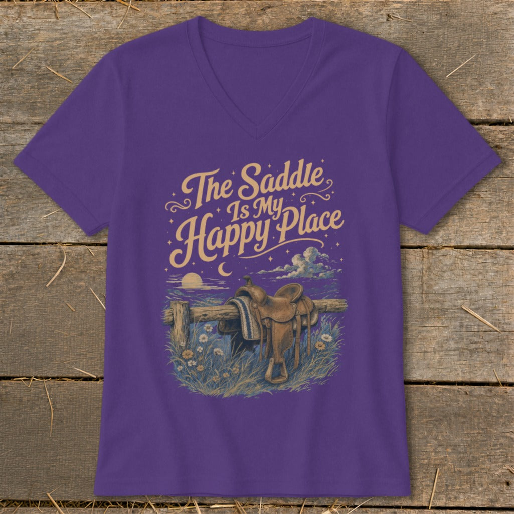 Purple v-neck shirt with "The Saddle Is My Happy Place" and a saddle on a fence.