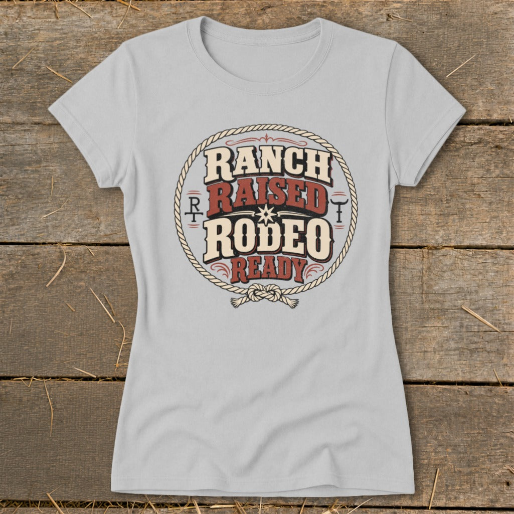 Light grey t-shirt with "Ranch Raised Rodeo Ready" text inside a rope circle.