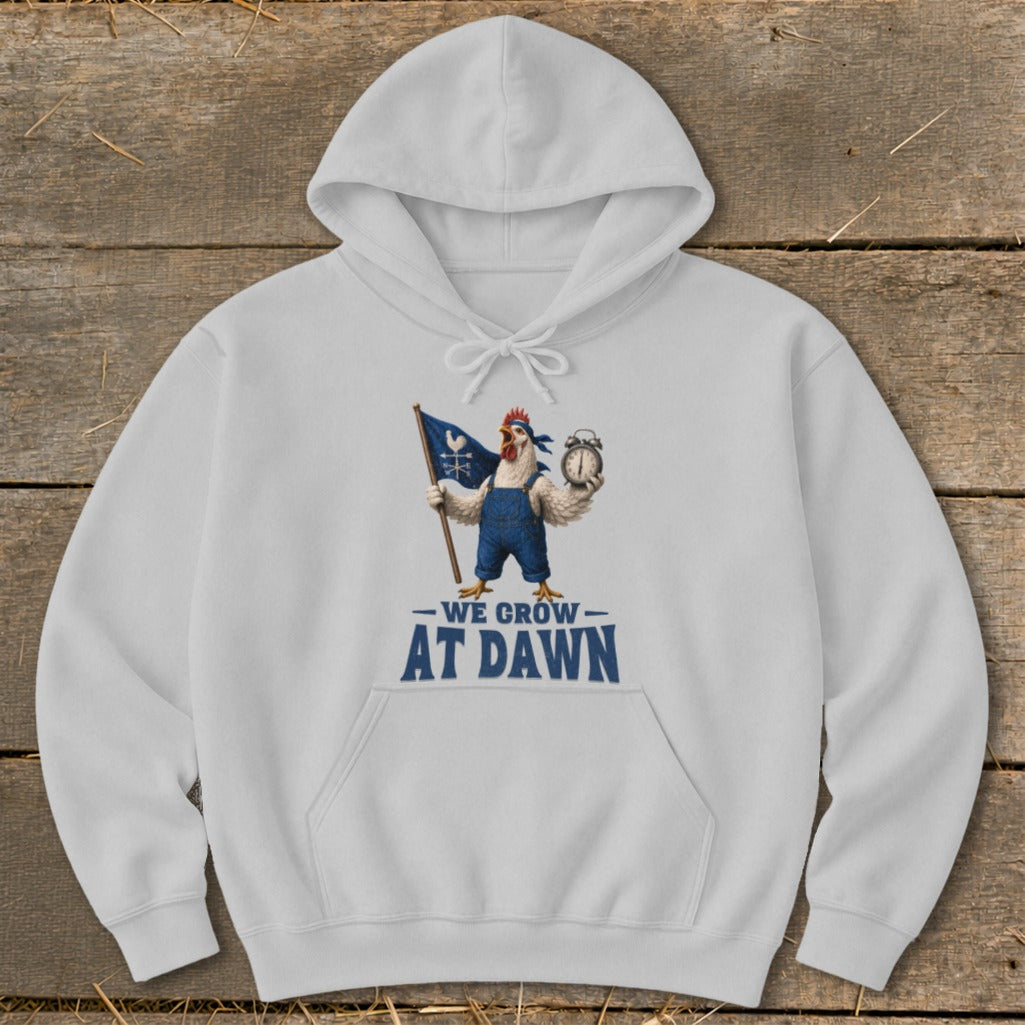 White hoodie with a graphic of a chicken holding a flag and alarm clock, saying "We Grow At Dawn".