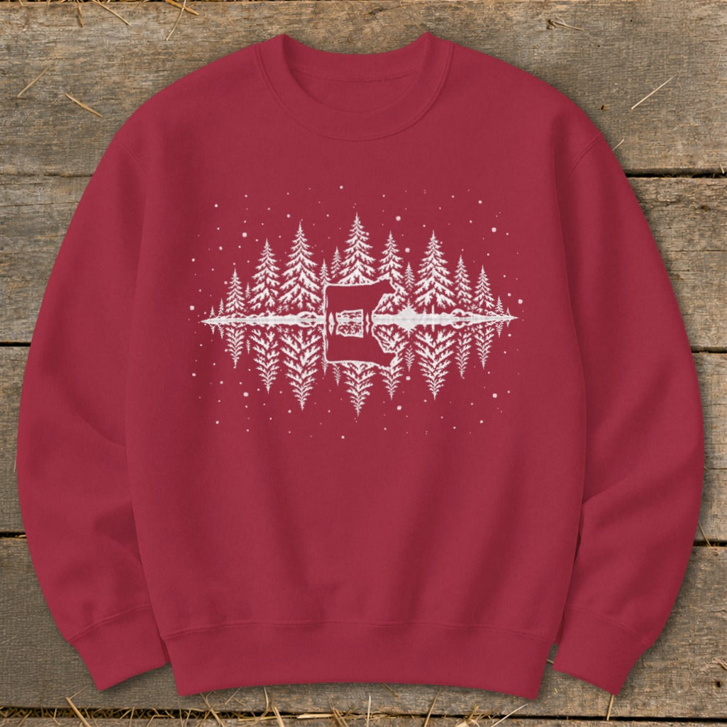 Red sweatshirt with a white graphic of a cow silhouetted against a pine forest reflection.