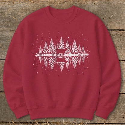 Red sweatshirt with a white graphic of a cow silhouetted against a pine forest reflection.
