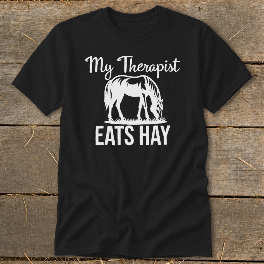 Black t-shirt with white text and graphic of a horse eating hay.