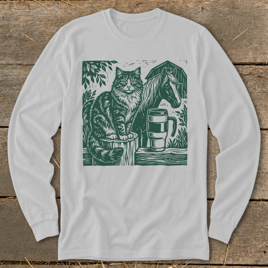 Green linocut illustration of a cat, horse, and mug on a farm.