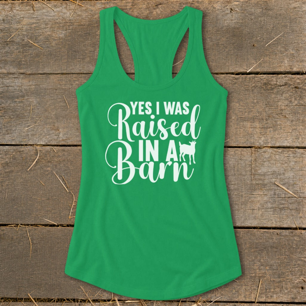 Green tank top with white text "Yes I Was Raised In A Barn" and goat graphic.