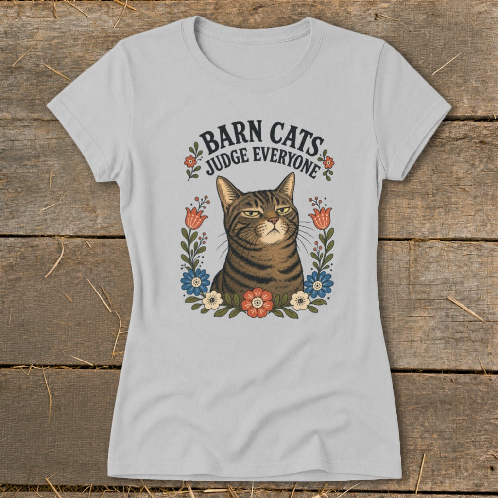 Light gray t-shirt with a tabby cat and flowers, reading "Barn Cats Judge Everyone."