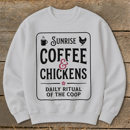 White sweatshirt with "Sunrise Coffee & Chickens Daily Ritual of the Coop" text.