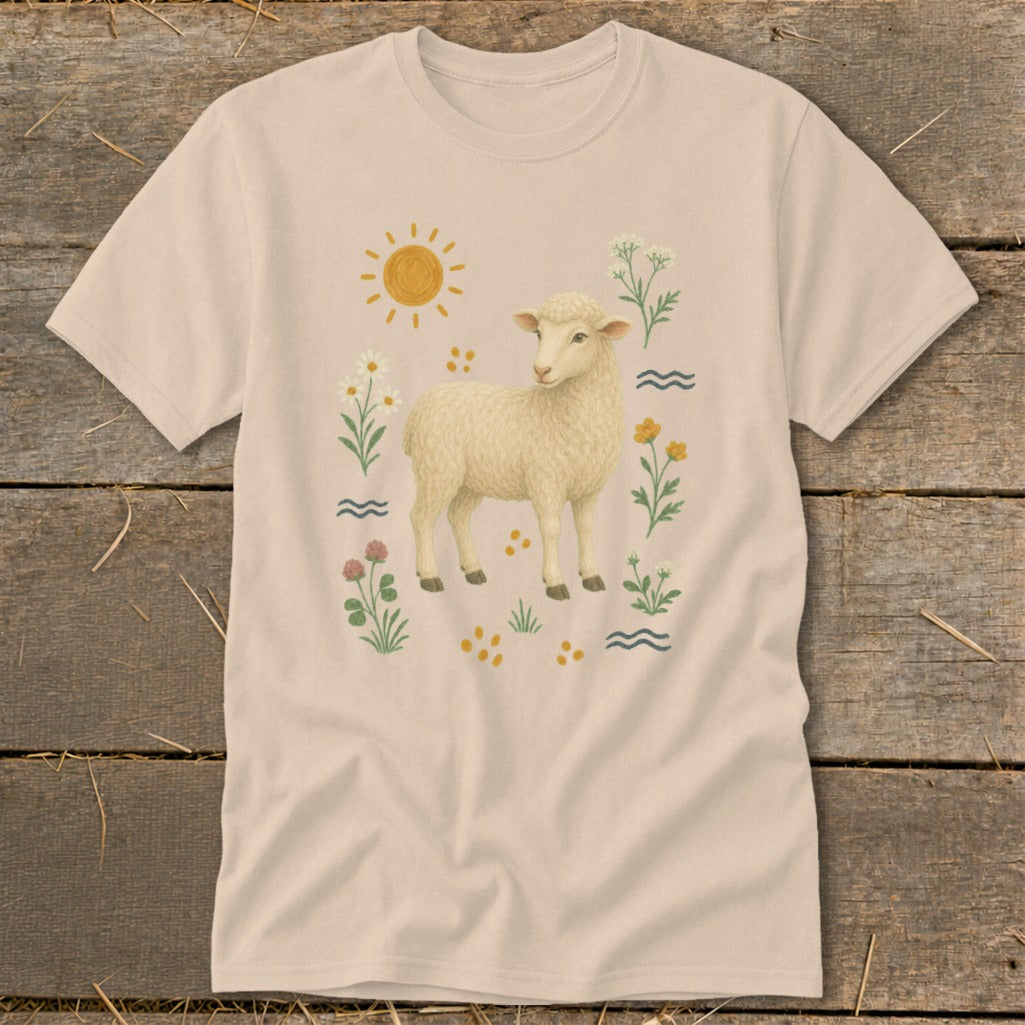 Light beige t-shirt with a graphic of a sheep and flowers under a sun.