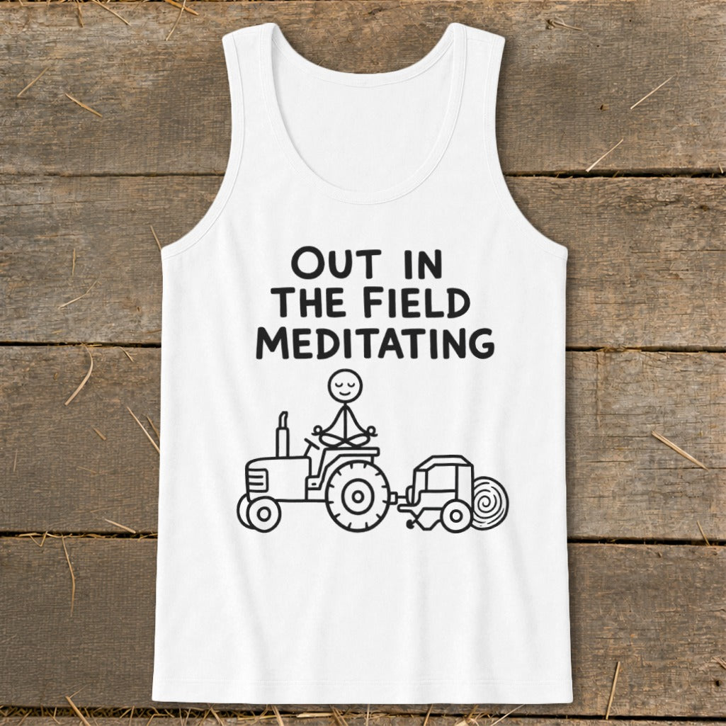 White tank top with "Out in the Field Meditating" and stick figure meditating on tractor.