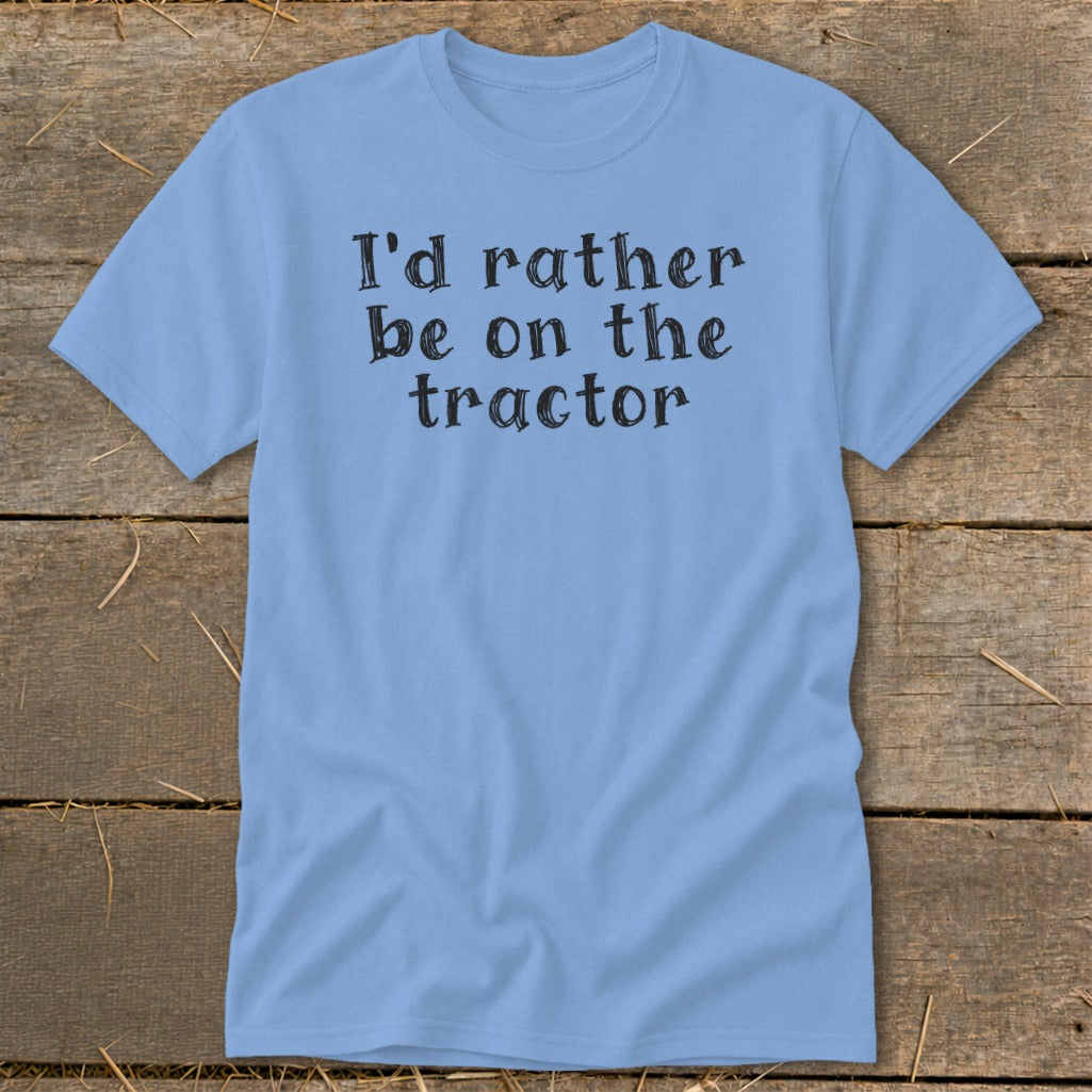 Light blue t-shirt with black text "I'd rather be on the tractor".