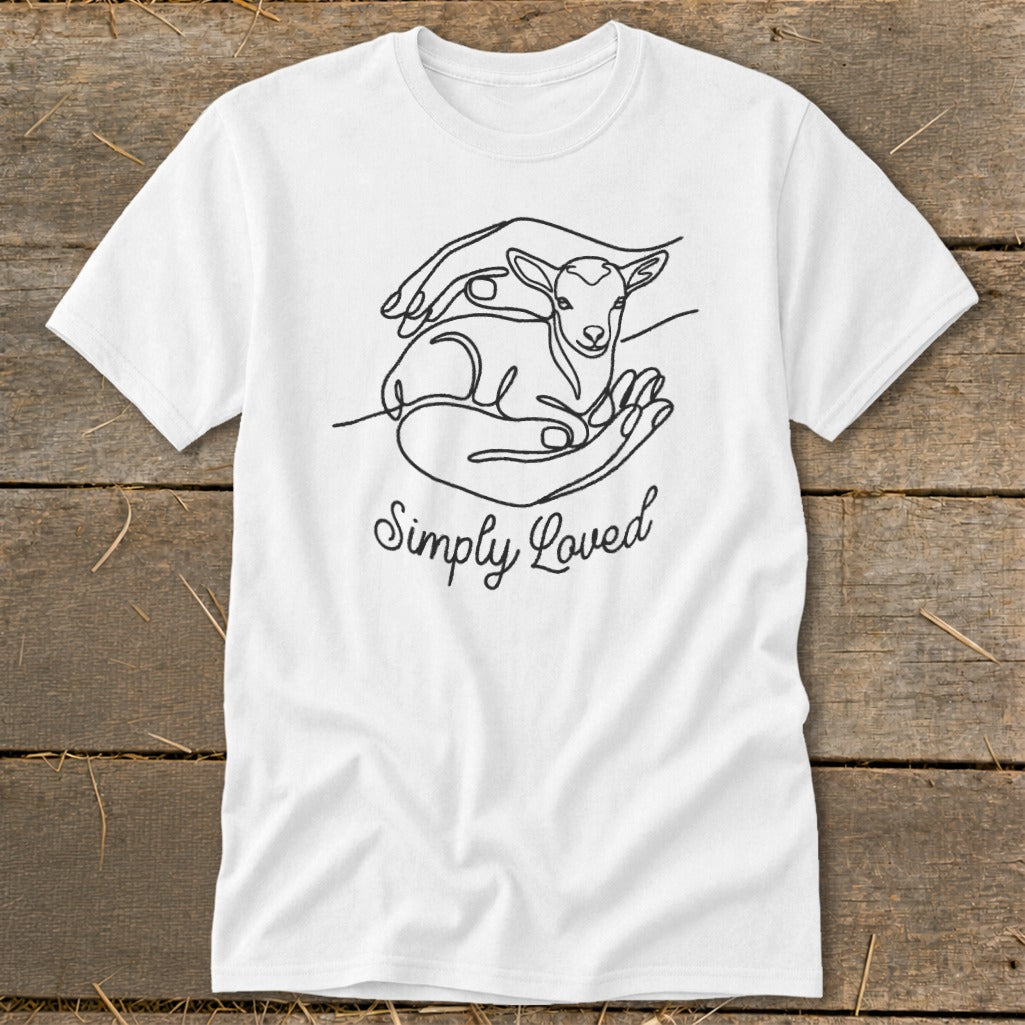 White t-shirt with line art of a lamb in hands and text "Simply Loved".