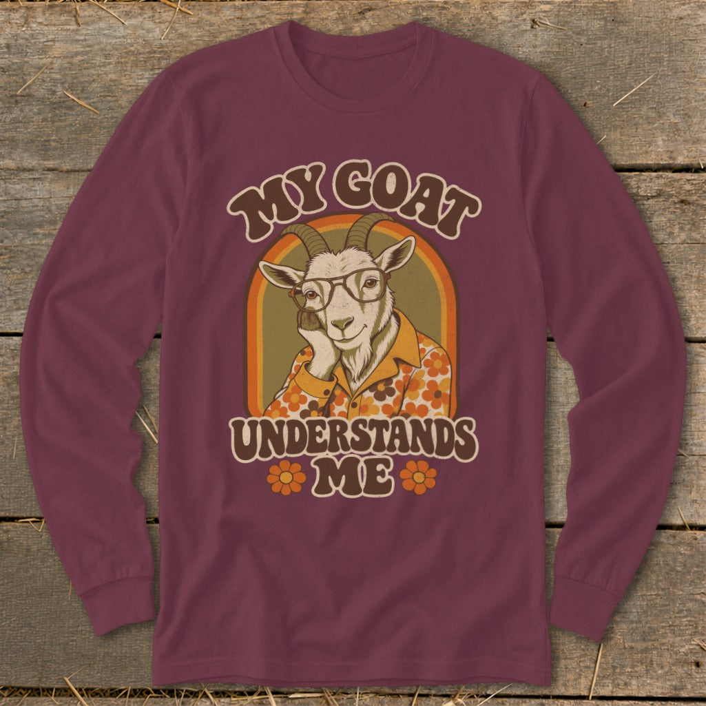 Maroon long sleeve shirt with a retro graphic of a goat wearing glasses and a floral shirt.