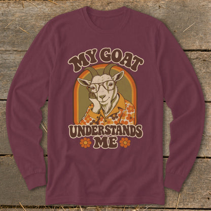 Maroon long sleeve shirt with a retro graphic of a goat wearing glasses and a floral shirt.