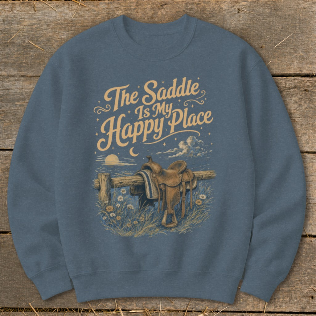 Sweatshirt with "The Saddle Is My Happy Place" text and a saddle on a fence.