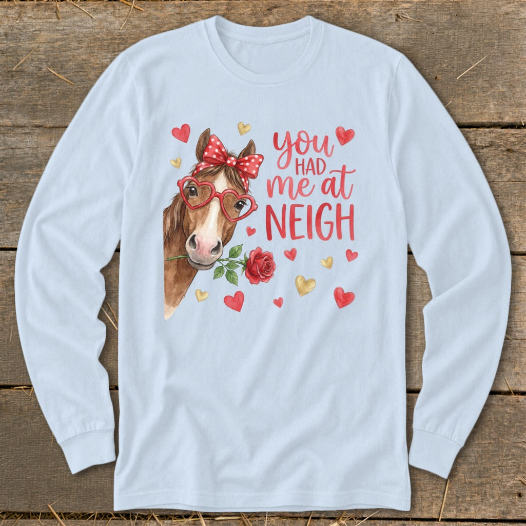 Light blue long-sleeve shirt with horse, rose, and text "you had me at neigh".