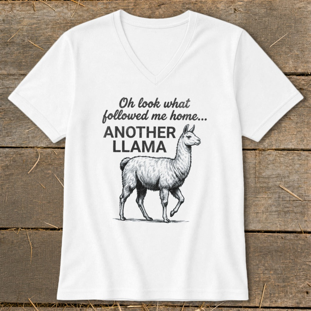 White v-neck t-shirt with text "Oh look what followed me home... ANOTHER LLAMA" and llama illustration.