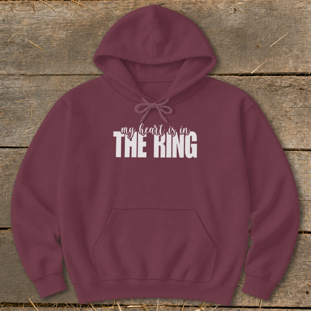Maroon hooded sweatshirt with "my heart is in THE RING" printed in white text.