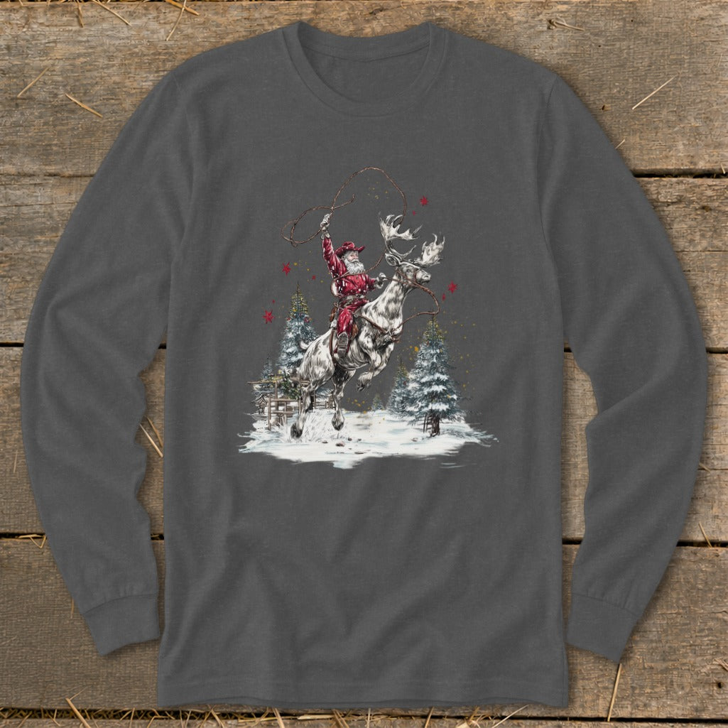 Santa rides a bucking moose with lasso in a snowy scene with pine trees.