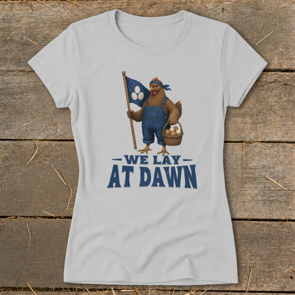 T-shirt with cartoon chicken holding flag and basket of eggs, text "We Lay At Dawn".