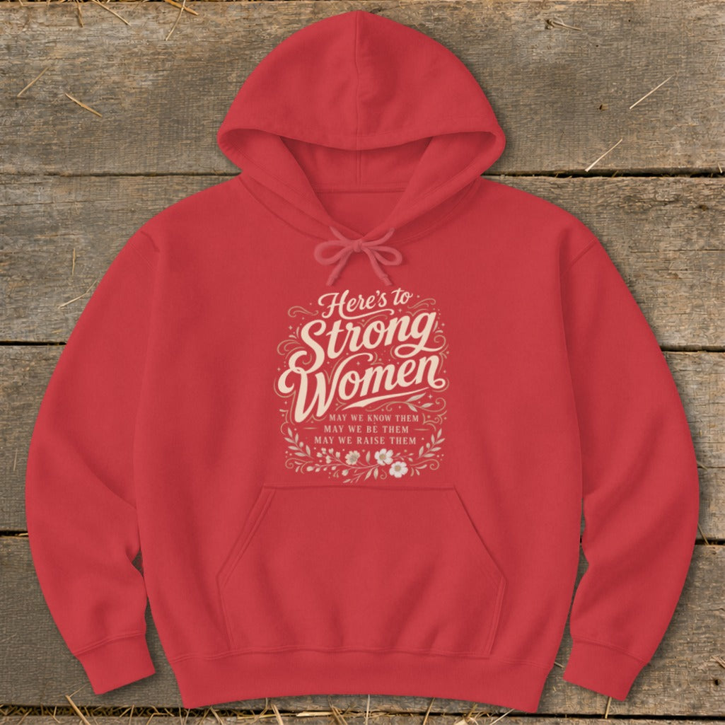 Red hoodie with "Here's to Strong Women" text and floral accents.