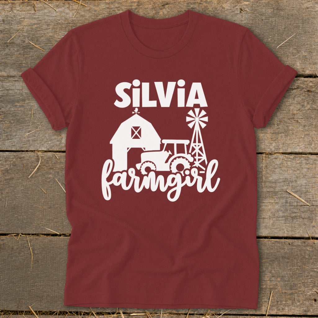 Maroon t-shirt with white "SILVIA farmgirl" text and farm graphics.