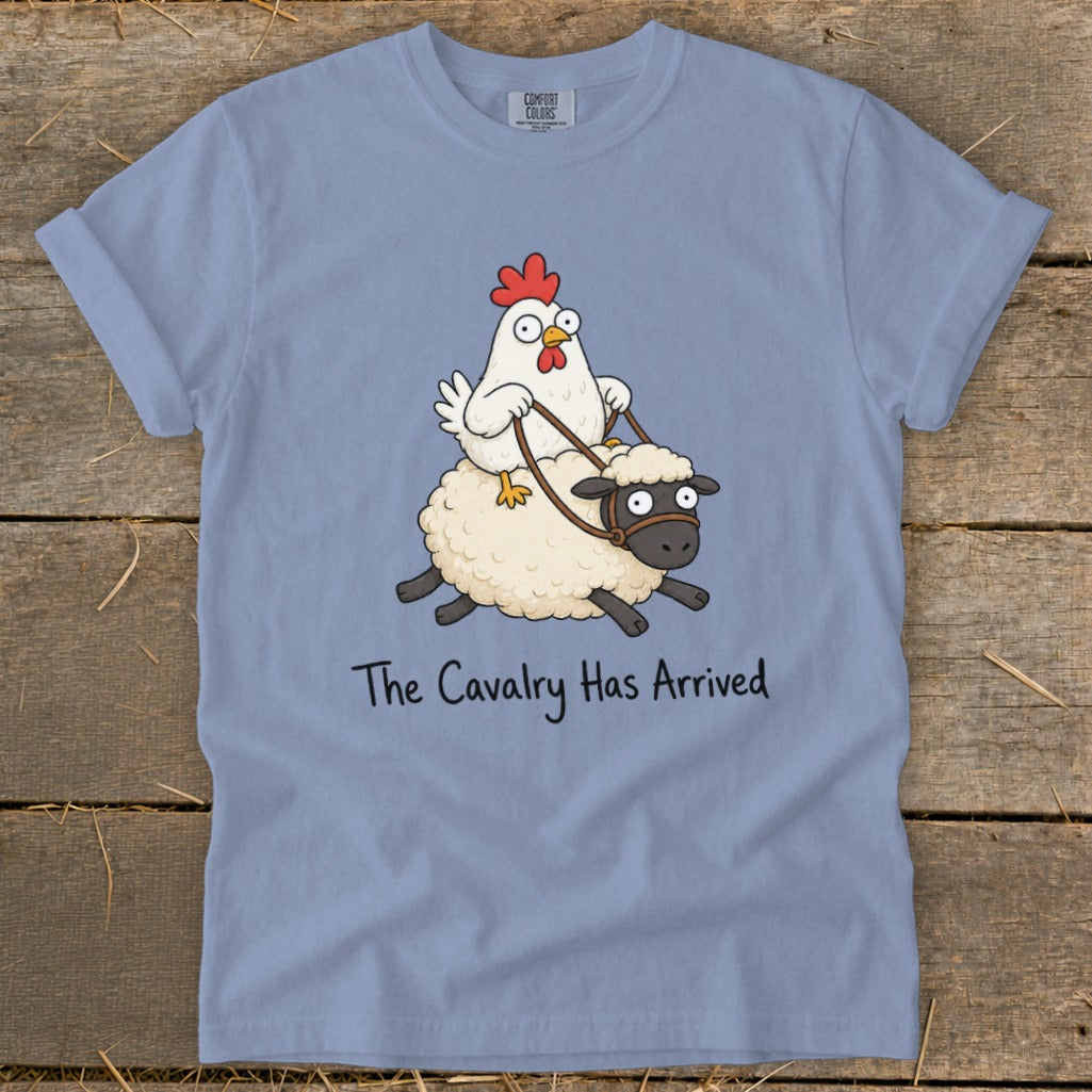 Light blue t-shirt with cartoon chicken riding a sheep, text "The Cavalry Has Arrived".