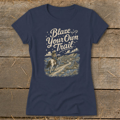 Navy t-shirt with "Blaze Your Own Trail" text and a rider on horseback in a desert landscape.