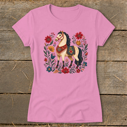 Pink t-shirt with a cream horse and floral wreath graphic.