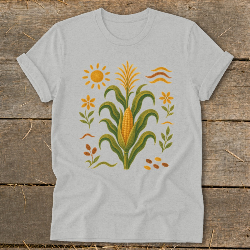 Light gray t-shirt with a corn stalk, sun, and floral motif design.