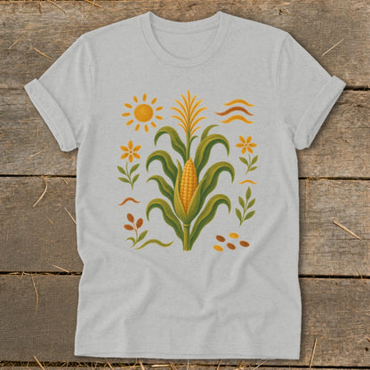 Light gray t-shirt with a corn stalk, sun, and floral motif design.
