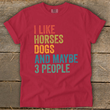 Red t-shirt with text "I LIKE HORSES DOGS AND MAYBE 3 PEOPLE".