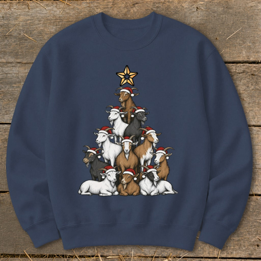 Goats stacked in a Christmas tree shape wearing Santa hats with a star on top.
