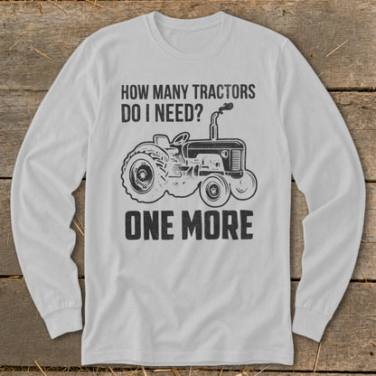 Long sleeve shirt with "How Many Tractors Do I Need? One More" and tractor graphic.