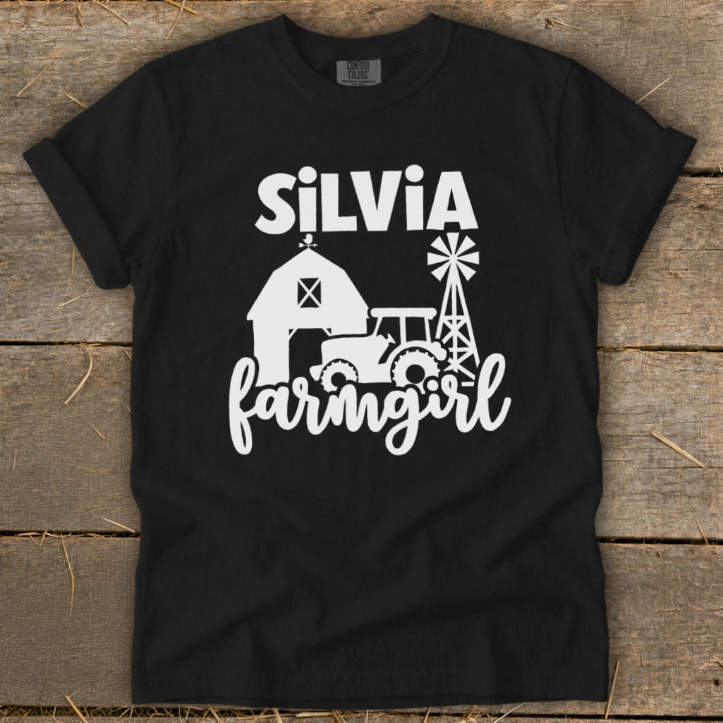 Black t-shirt with "Silvia farmgirl" text, barn, tractor, and windmill graphics.