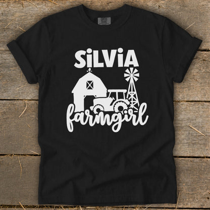 Black t-shirt with "Silvia farmgirl" text, barn, tractor, and windmill graphics.