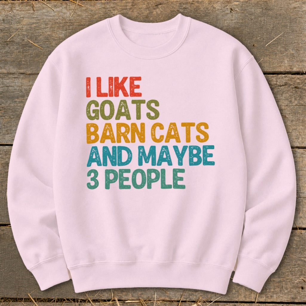 Light pink sweatshirt with text "I like goats barn cats and maybe 3 people".