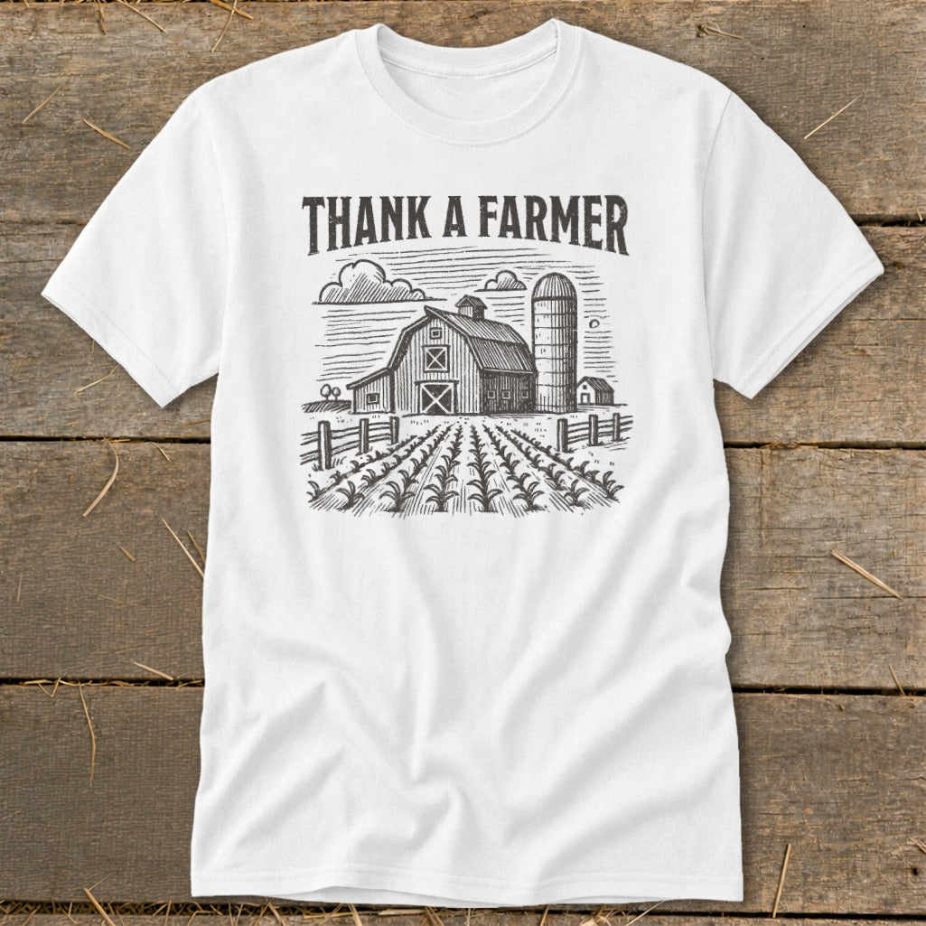 White t-shirt with "Thank A Farmer" text and a farm scene.