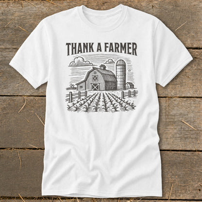 White t-shirt with "Thank A Farmer" text and a farm scene.