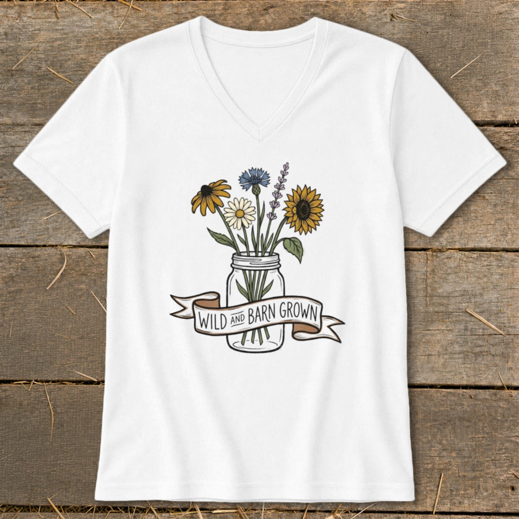 White v-neck t-shirt with a mason jar of wildflowers and a banner reading "Wild and Barn Grown".