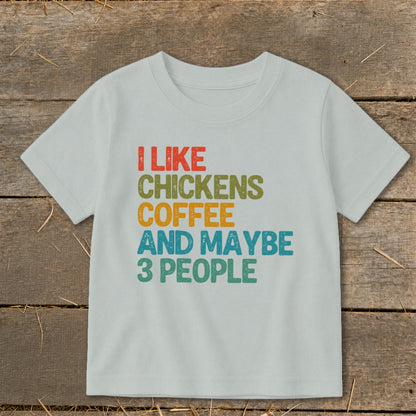 Light grey t-shirt with colorful text: "I like chickens, coffee and maybe 3 people."
