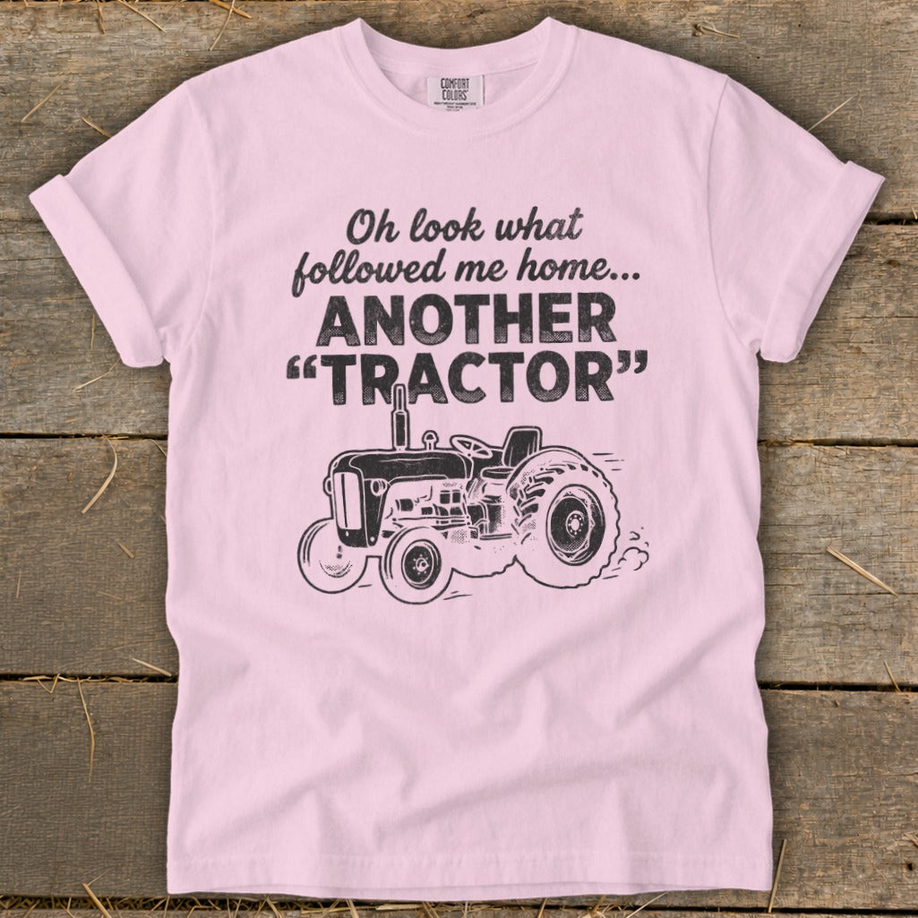 Pink t-shirt with "Oh look what followed me home... ANOTHER "TRACTOR"" and a tractor graphic.