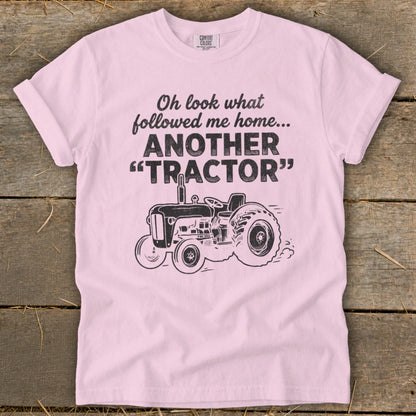Pink t-shirt with "Oh look what followed me home... ANOTHER "TRACTOR"" and a tractor graphic.