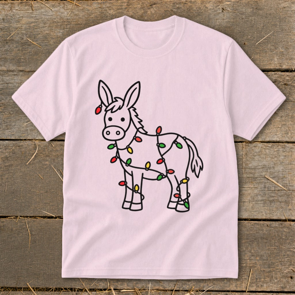 Pink t-shirt with a cartoon donkey wrapped in Christmas lights.