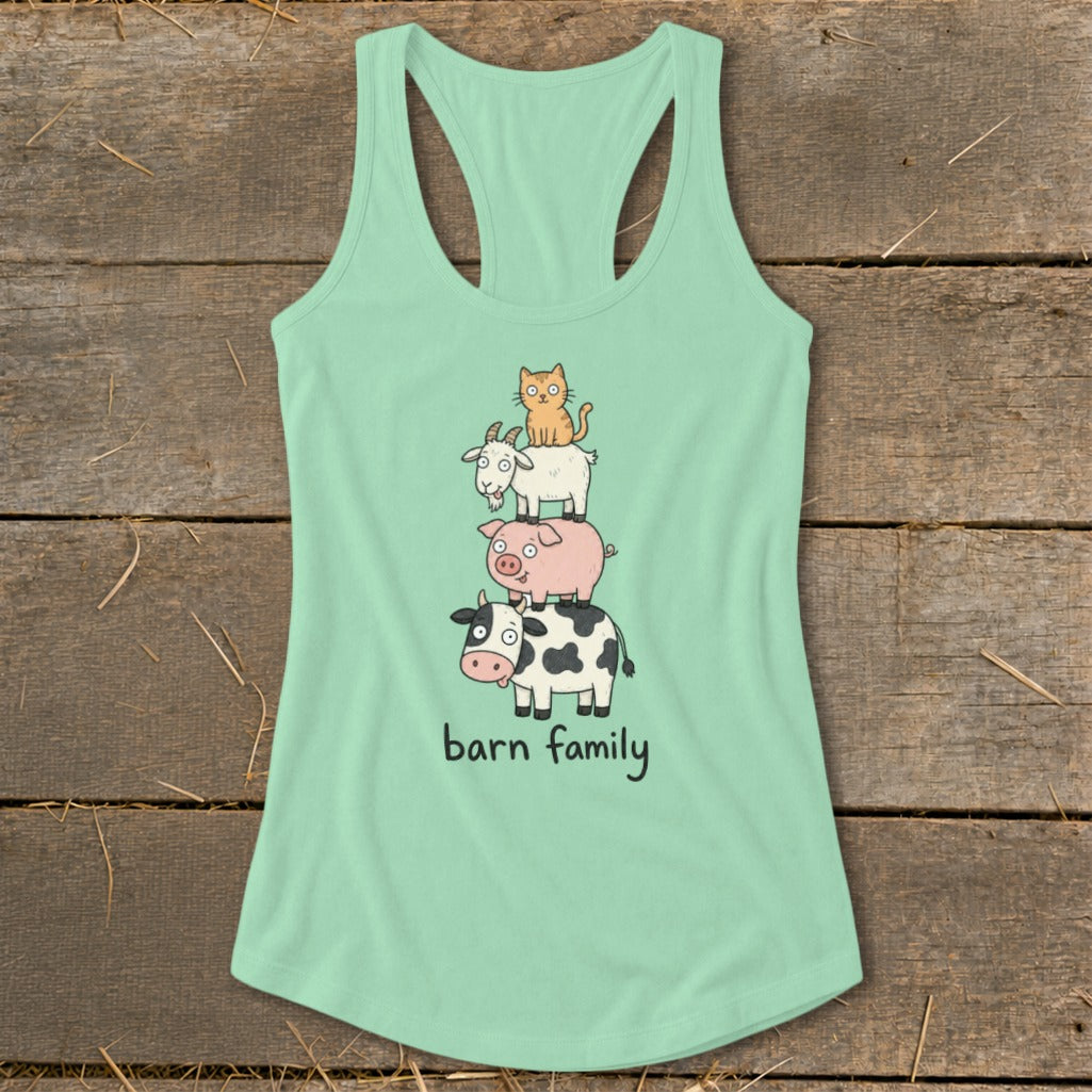 Mint green tank top with stacked cartoon cow, pig, goat, and cat graphic and "barn family" text.