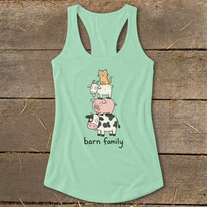 Mint green tank top with stacked cartoon cow, pig, goat, and cat graphic and "barn family" text.