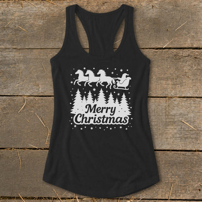 Black racerback tank top with white Christmas design featuring horses, Santa's sleigh, trees, and text.