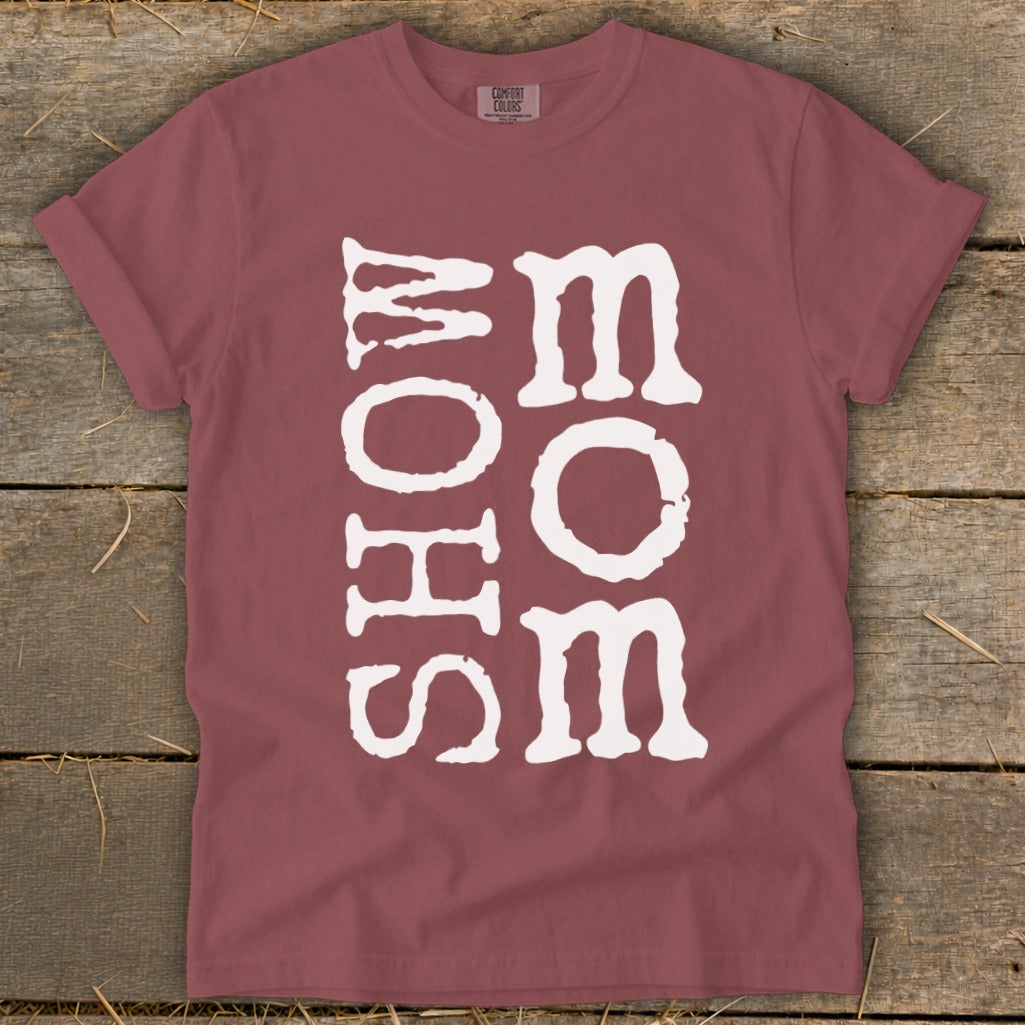 Maroon t-shirt with white text reading "SHOW MOM" vertically stacked.