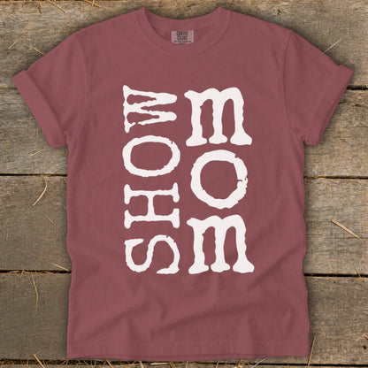 Maroon t-shirt with white text reading "SHOW MOM" vertically stacked.