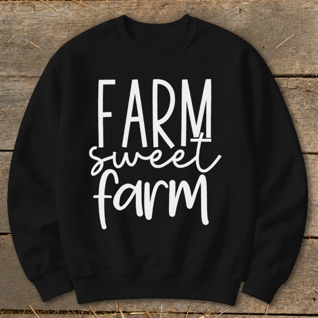 Black sweatshirt with "Farm sweet farm" text in white lettering.
