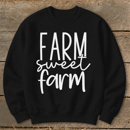 Black sweatshirt with "Farm sweet farm" text in white lettering.